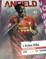 Signed Liverpool programme by Gerrard Toure and Sturridge